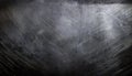 Worn and scratched gunmetal texture with dark gray metallic tones and scattered scuff marks Royalty Free Stock Photo