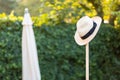 Worn Straw Hat on a Garden Tool Concept Shot for gardening, rest, work done
