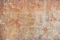 Worn stucco wall in ochre and earth colours Royalty Free Stock Photo