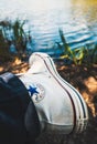 Worn white Converse Chuck Taylor All Star sneaker