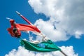 Worned, tattered hungarian flag by the strong wind on the top of the mountain in Transylvania Royalty Free Stock Photo