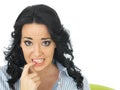 Worried Anxious Confused Young Woman Biting her Nail Royalty Free Stock Photo