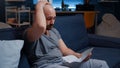 Worried anxious young man reading bad message in postal letter Royalty Free Stock Photo