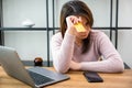 Worried Asian woman having problem with blocked credit card Royalty Free Stock Photo