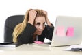 Worried attractive businesswoman in stress working with laptop c Royalty Free Stock Photo