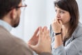 Worried young woman with social problems during psychotherapy Royalty Free Stock Photo