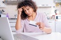 Worried black woman about denied credit card transaction