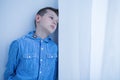 Worried boy spends afternoon alone Royalty Free Stock Photo