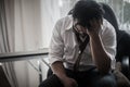 Worried business man at workplace in office after tired from hard work. Royalty Free Stock Photo