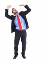 Worried businessman standing and pushing up Royalty Free Stock Photo