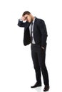 Worried businessman touching his forehead. Royalty Free Stock Photo