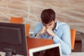 Worried businessman working at his desk in his office Royalty Free Stock Photo