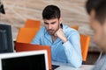 Worried businessman working at his desk in his office Royalty Free Stock Photo