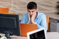 Worried businessman working at his desk in his office Royalty Free Stock Photo