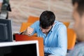 Worried businessman working at his desk in his office Royalty Free Stock Photo