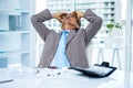 Worried businessman working at his desk Royalty Free Stock Photo