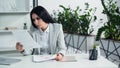 worried businesswoman looking at documents in Royalty Free Stock Photo