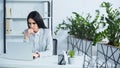 worried businesswoman using laptop in modern Royalty Free Stock Photo