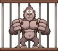 Worried cartoon gorilla trapped in a cage Royalty Free Stock Photo