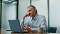 Worried ceo sitting workplace closeup. Stressed businessman getting bad news Royalty Free Stock Photo