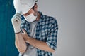 Worried construction engineer with protective face mask Royalty Free Stock Photo