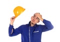 Worried construction worker with yellow helmet Royalty Free Stock Photo