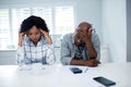 Worried couple checking the bills Royalty Free Stock Photo