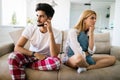 Worried couple having problems in bedroom Royalty Free Stock Photo