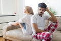 Worried couple having problems in bedroom Royalty Free Stock Photo