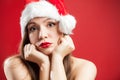 Worried depressed attractive caucasian brunette woman dressed as Mrs Santa Claus Royalty Free Stock Photo