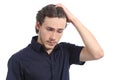 Worried depressed man with the hand on the head