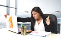 Worried and desperate businesswoman suffering stress working at office computer desk