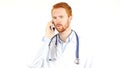 worried doctor calling someone , speaking on the phone Royalty Free Stock Photo