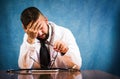 Worried doctor showing concern on the table