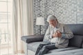 Worried elder senior man feeling bad, upset old middle aged grandfather touching chest feel sudden pain heartburn having heart Royalty Free Stock Photo