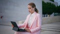 Worried freelancer working laptop sitting bench outdoors closeup. Business woman Royalty Free Stock Photo