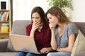 Worried friends watching media content on line