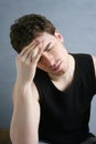 Worried gesture pain young man headache Royalty Free Stock Photo