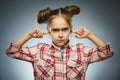 Worried girl covering her ears, observing. Hear nothing Royalty Free Stock Photo