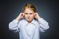 Worried girl covering her ears, observing. Hear nothing Royalty Free Stock Photo