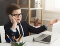 Worried little boy in suit having serious business talk Royalty Free Stock Photo