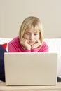 Worried Looking Girl Using Laptop Royalty Free Stock Photo