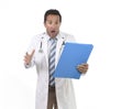 Worried male medicine doctor with stethoscope in medical gown reading clipboard diagnostic stressed Royalty Free Stock Photo