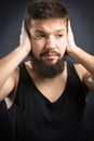 Worried man with hands on face Royalty Free Stock Photo