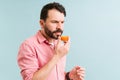 Worried man losing his sense of smell Royalty Free Stock Photo