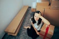 Stressed Woman Feeling Overwhelmed by Relocating in a New Home Royalty Free Stock Photo