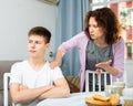 Worried mother scolding teenage son Royalty Free Stock Photo