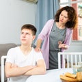 Worried mother talking to son Royalty Free Stock Photo