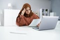 Worried Muslim Woman Doing Taxes Royalty Free Stock Photo