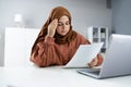 Worried Muslim Woman Doing Taxes Royalty Free Stock Photo